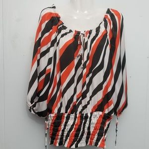 Orange and black striped blouse